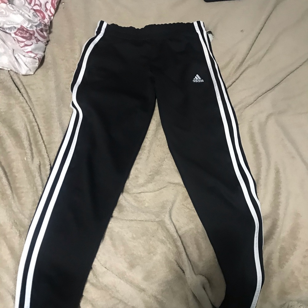 Black and gray adidas joggers